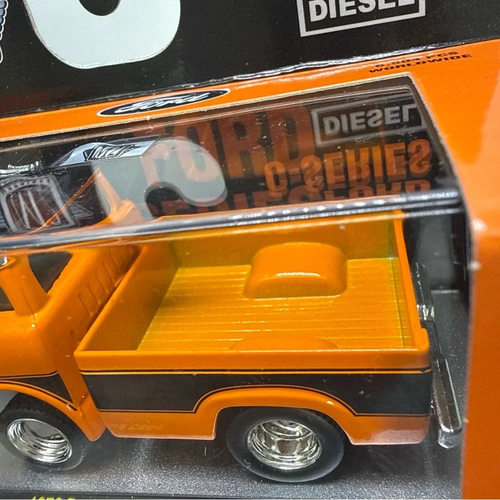 Machine Ford C-Series Diecast Truck - Orange & Black